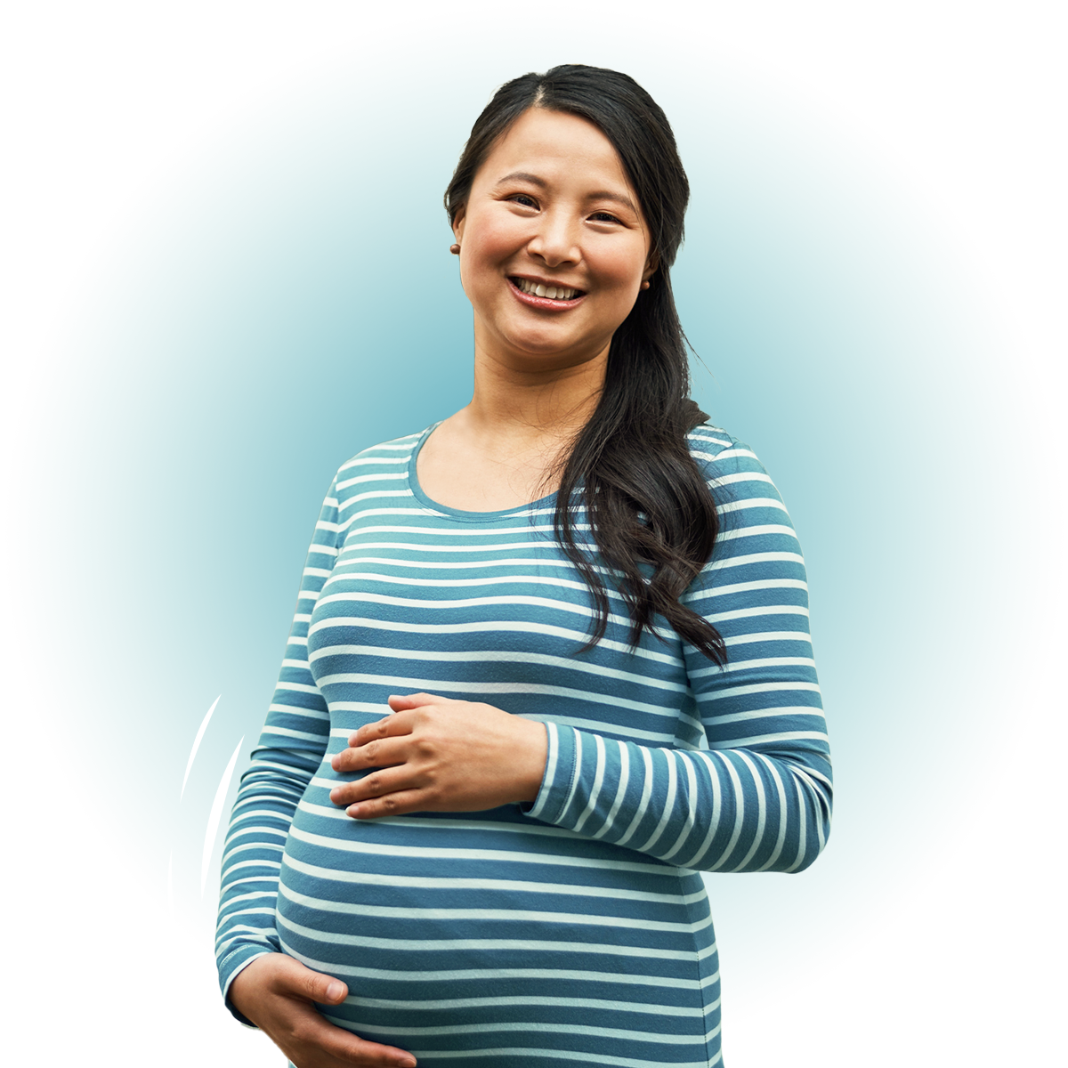 A pregnant woman wearing a horizontally striped long sleeve shirt holds her belly while smiling at us.