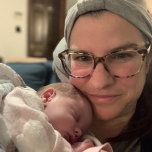 Cathleen holds her baby, Margot.