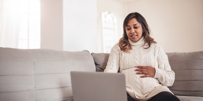 A pregnant mom counts her baby's kicks on the web-counting platform.